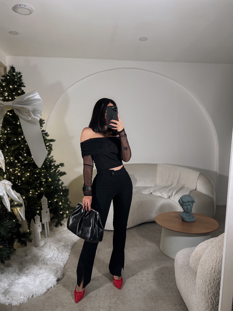 Pantalón vivos negro capella